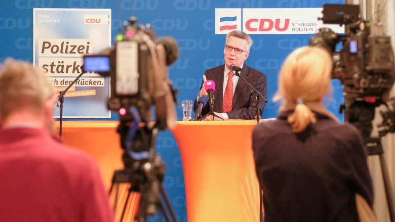 Bundesinnenminister Thomas de Maizière bei einer Veranstaltung in Harrislee